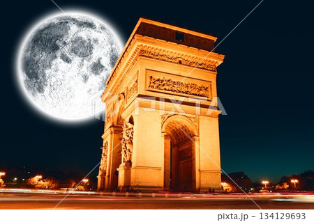 Large moon over arc de triomph Large moon over arc de triomph 134129693
