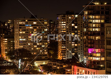 Illuminated towers in city 134129705