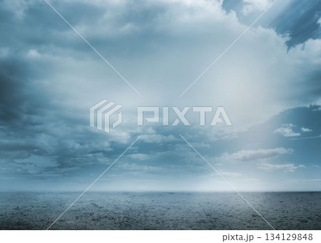 Flat design illustration showing tranquil ocean horizon under cloudy sky with rippled water 134129848