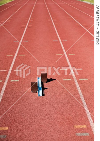 High angle view of track starting block on field 134129897