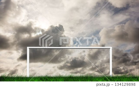 Football goal under grey cloudy sky Football goal under grey cloudy sky 134129898