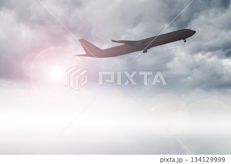 Airplane flying over clouds Airplane flying over clouds 134129999