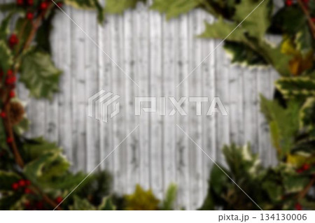 Flat design white board is featuring holly leaves, red berries and pine branches border, copy space Flat design white board is featuring holly leaves, red berries and pine branches border, copy space 134130006