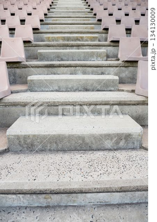Low angle view of empty steps amidst seats 134130009