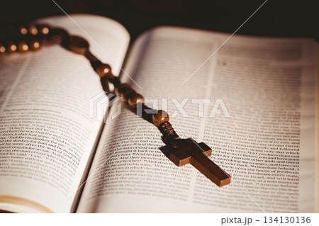 Open bible with rosary beads and cross Open bible with rosary beads and cross 134130136