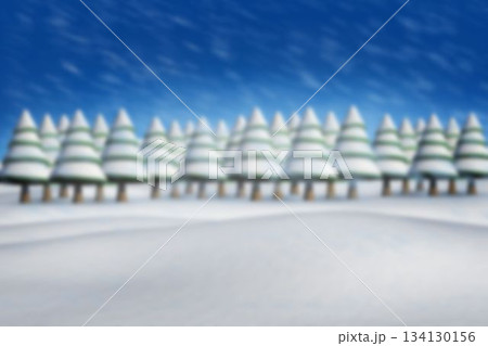 Snow-topped evergreen trees standing along winter snowdrifts under blue sky with falling snow 134130156