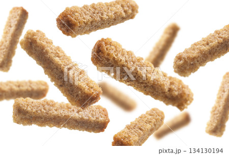 Bread croutons levitate on a white background Bread croutons levitate on a white background 134130194