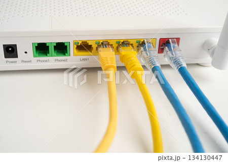Ethernet cable with wireless router connect to internet service provider network. Ethernet cable with wireless router connect to internet service provider network. 134130447