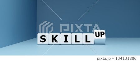 Skill Up and Professional Development Concept with Letter Blocks on Blue Background Skill Up and Professional Development Concept with Letter Blocks on Blue Background 134131886