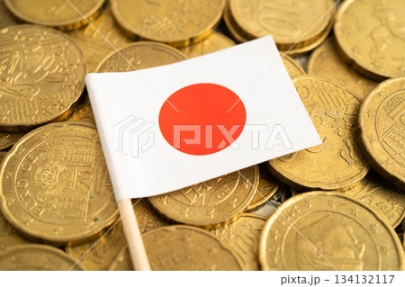 Japan flag on coins background for finance banking business. 134132117