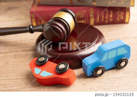Car accident lawsuit and insurance, Judge hammer with car model. 134132119