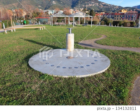 Sundial in park early in morning. Educational and models for astronomy.  134132811