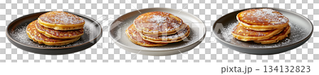 Stack of fluffy golden pancakes sprinkled with powdered sugar on a ceramic plate, isolated on white background Stack of fluffy golden pancakes sprinkled with powdered sugar on a ceramic plate, isolated on white background 134132823