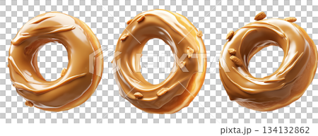 Tasty caramel-glazed donut topped with crunchy nuts, isolated on white transparent background 134132862