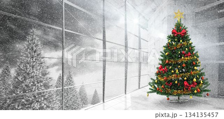 Christmas tree is standing with red bows in flat design lobby with snowy forest outside windows Christmas tree is standing with red bows in flat design lobby with snowy forest outside windows 134135457