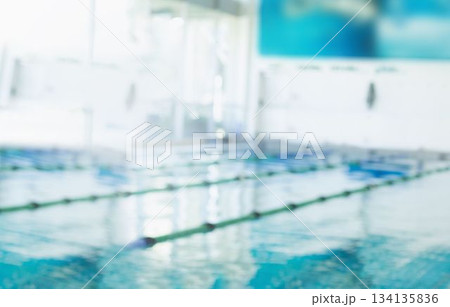 Central lap pool is reflecting natural light in flat design, featuring green white lane ropes Central lap pool is reflecting natural light in flat design, featuring green white lane ropes 134135836