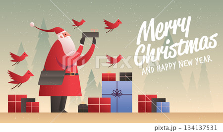 Santa Merry Christmas New Year 2026 celebration festive scene with Santa Claus holding a gift surrounded by red birds and presents in snowy forest 134137531