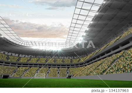 Modern sports stadium is showcasing green grass pitch, floodlit transparent roof and cheering crowd 134137963
