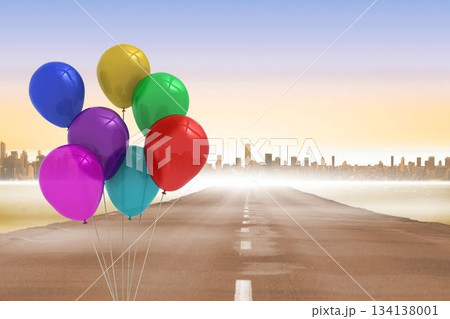 Seven balloons are floating beside asphalt road leading toward misty city skyline in flat design Seven balloons are floating beside asphalt road leading toward misty city skyline in flat design 134138001