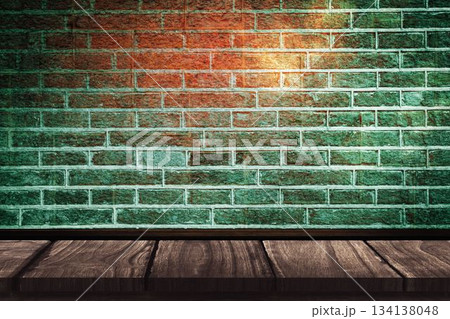 Light on green brick wall 134138048