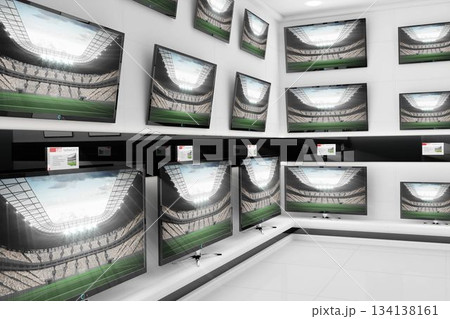 Flat design TVs are lining showroom walls with price tags, showing stadium views under LED lights Flat design TVs are lining showroom walls with price tags, showing stadium views under LED lights 134138161