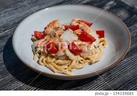 Pasta with shrimp and tomatoes. Pasta with shrimp and tomatoes. 134139883