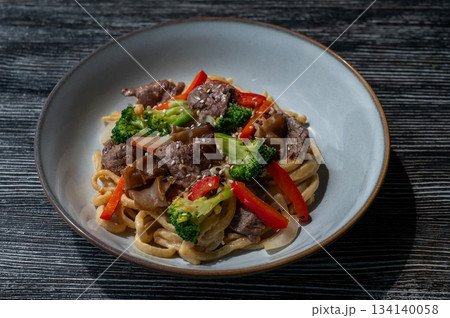 Top view of pasta with beef and broccoli. Top view of pasta with beef and broccoli. 134140058