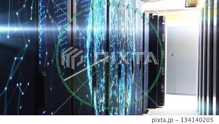 Server rack cabinets monitoring network in data center aisle, with world map and green radar grid 134140205
