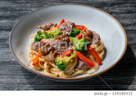 Top view of pasta with beef and broccoli. Top view of pasta with beef and broccoli. 134140315