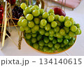 Large juicy grapes on a mirror surface. Vegetarian food 134140615
