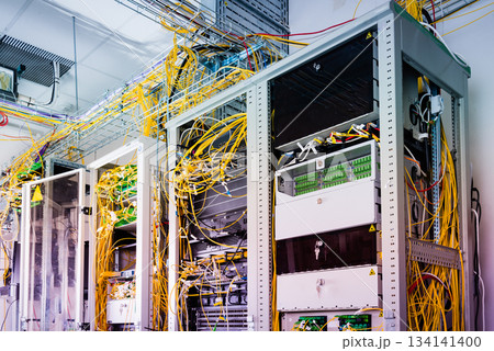 servers with connected fiber optic cables servers with connected fiber optic cables 134141400