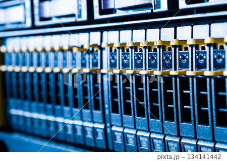 Array of data storage hard drives in internet data center 134141442