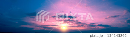 Colorful cloudy sky at sunset. Sky texture. Abstract nature background. Horizontal banner 134143262