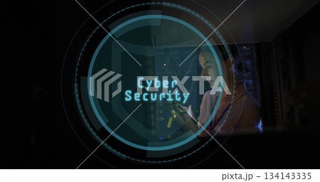 Network engineer connecting cables in data center, with cybersecurity overlay, copy space 134143335