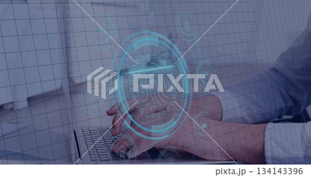 Typing male hands using laptop at office desk, showing digital fingerprint security icons Typing male hands using laptop at office desk, showing digital fingerprint security icons 134143396