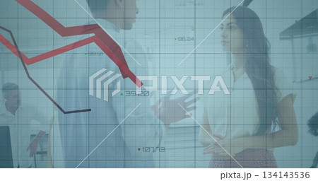 Discussing woman and man sharing financial insights in office meeting with glass partition overlay 134143536