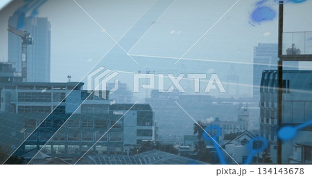 Showing solar-paneled office buildings standing behind glass, with crane and digital overlay 134143678