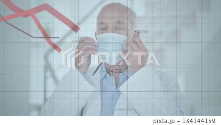 Putting on surgical mask physician wearing white lab coat in clinic corridor, with data overlay 134144159