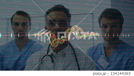 Monitoring doctors in lab coat and scrubs analyzing vitals on display in clinic, with stethoscope 134144363