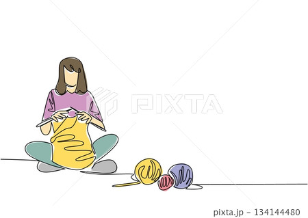 Single line drawing of a woman knitting with colorful yarn balls conveys the creative nature concept, celebrating Worldwide Knit in Public Day as a joyful international event illustration. Single line drawing of a woman knitting with colorful yarn balls conveys the creative nature concept, celebrating Worldwide Knit in Public Day as a joyful international event illustration. 134144480