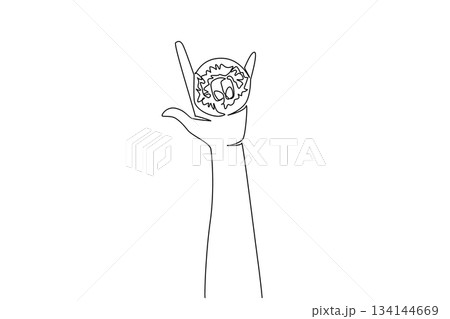 One line drawing of a hand holding a donut in a rock-and-roll gesture, blending fun and creativity. Food concept with an international celebration theme, National Donut Day. 134144669