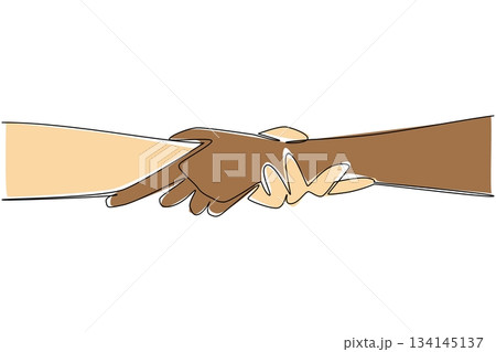 A continuous line drawing of two hands clasped together in different skin tones symbolizes unity, trust, and equality for Race Unity Day, promoting peace, solidarity, and mutual respect. 134145137