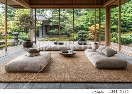 A serene Japanese minimalist interior featuring natural wood, clean lines, soft daylight, and a calm zen-inspired atmosphere. 134145186