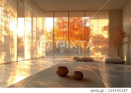 A serene Japanese minimalist interior featuring natural wood, clean lines, soft daylight, and a calm zen-inspired atmosphere. 134145187