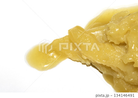 Rendered animal fat tallow lard melting chicken close up 134146491