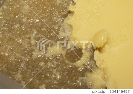 Rendered animal fat tallow lard melting chicken close up 134146497