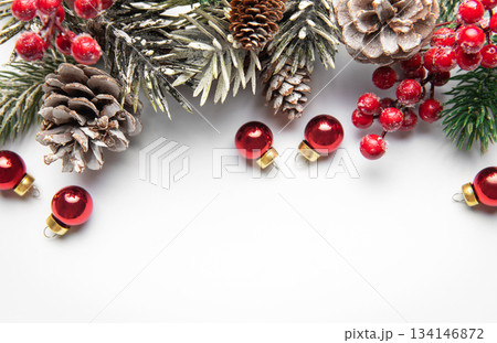 Christmas winter holiday decoration with pinecones and red berries 134146872