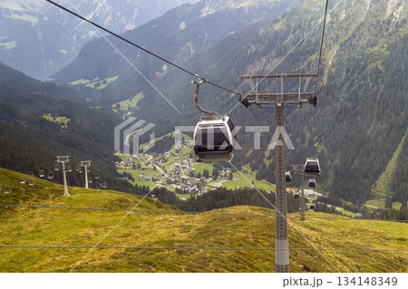 Gargellen cable car travels over Montafon valley in Vorarlberg Austria during summer Gargellen cable car travels over Montafon valley in Vorarlberg Austria during summer 134148349