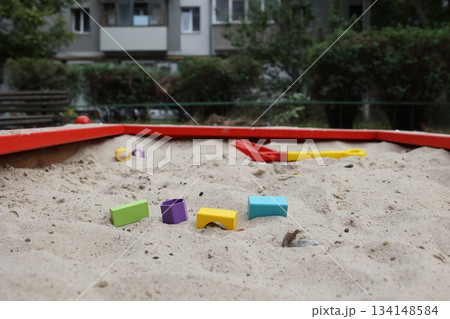 Sandbox with various outdoor toys. Sandbox for children's games. Summer concept. 134148584