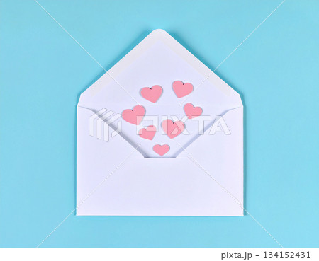 Floating Mail Correspondence. Post envelope with cute red hearts decoration. Valentine's Day concept. Floating Mail Correspondence. Post envelope with cute red hearts decoration. Valentine's Day concept. 134152431